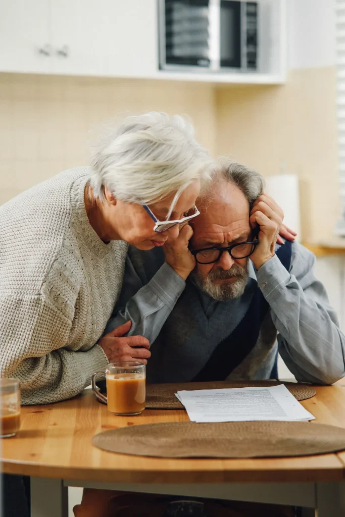 Homeowners reviewing a household budget
